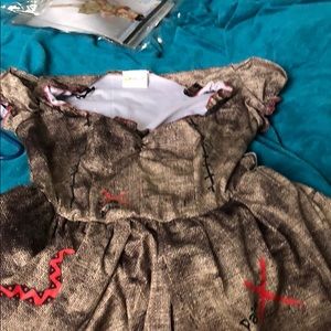 includes  Dress and wig with accessories